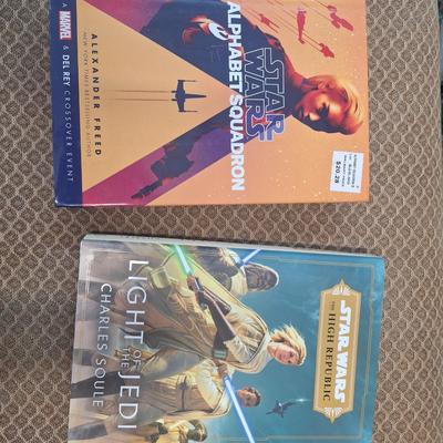 two hardcover Star Wars novels: Alphabet Squadron by Alexander Freed and Light of the Jedi by Charles Soule. Both appear to be First...