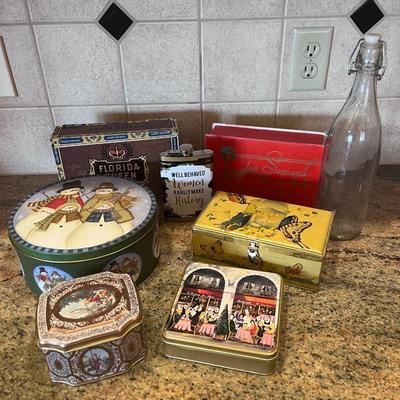 A COLLECTION OF TINS, BOTTLE AND BOXES