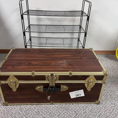 HEAVY METAL SHELF AND A TRUNK WITH A KEY