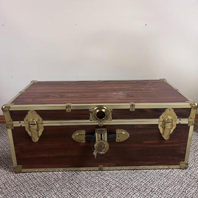 HEAVY METAL SHELF AND A TRUNK WITH A KEY