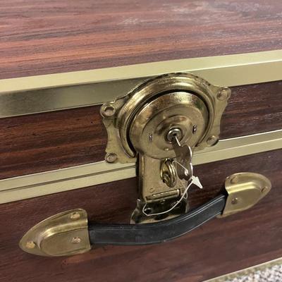 HEAVY METAL SHELF AND A TRUNK WITH A KEY