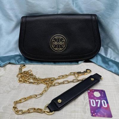 Sale Photo Thumbnail #113: Detachable chain, magnetic closure, clutch or cross body bag, black with gold tone chain.
11 x 6.5 inches 
1 interior and 1 exterior zippered pocket
Like new