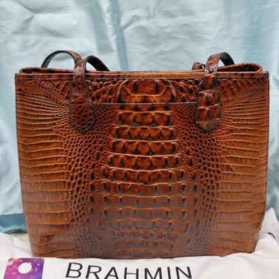 Sale Photo Thumbnail #117: Leather Croc embossed
includes dust bag
13 x 9.5 inches
1 interior zipper pocket, 2 interior slot pockets
2 handles
like new condition