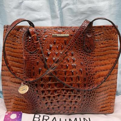 Sale Photo Thumbnail #116: Leather Croc embossed
includes dust bag
13 x 9.5 inches
1 interior zipper pocket, 2 interior slot pockets
2 handles
like new condition