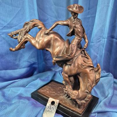 Sale Photo Thumbnail #135: Plaster figure of bucking horse
13 inches tall x 14 inches wide 
Some wear on the bronze patina