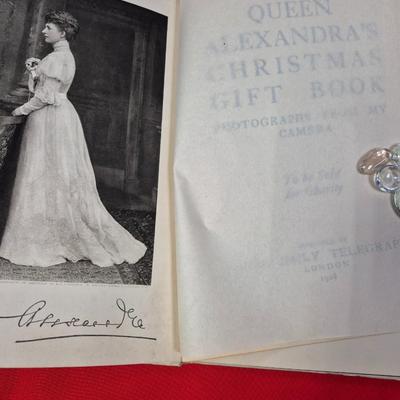 Sale Photo Thumbnail #151: Photo Album by Queen Alexandria, wife of King Edward VII  published in 1908 
Coronation of King George VI  Program  
Book of International Tributes to Princess Diana Stamp Collection   
   523 First Day covers w stamps from various countries
Queen Elizabe