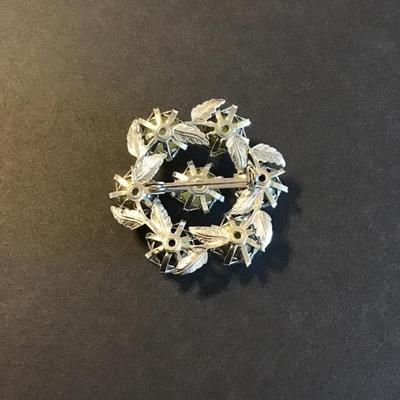 Sale Photo Thumbnail #107: Vintage chartreuse lucite or cabochons set in silver tone leaf-motif metal base 
Please see attached photos