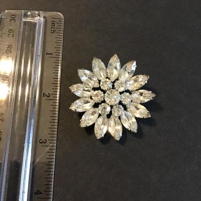 Sale Photo Thumbnail #126: Very nice clear rhinestone flower brooch 
Please see attached photos