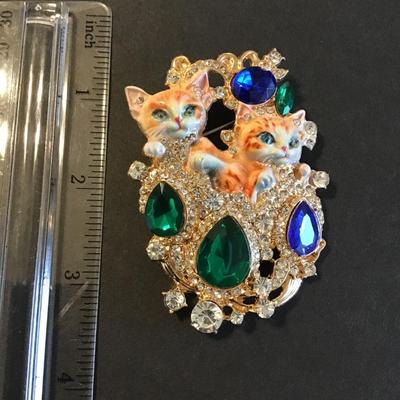 Sale Photo Thumbnail #139: Very cute multi colored rhinestone cat Brooch 
Please see attached photos