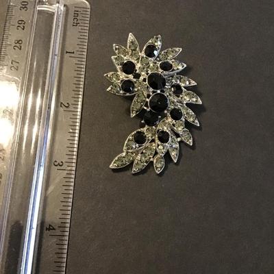 Sale Photo Thumbnail #201: Beautiful Large clear and black Rhinestone filigree flower leaves brooch 
Please see attached photos