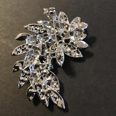 Sale Photo Thumbnail #202: Beautiful Large clear and black Rhinestone filigree flower leaves brooch 
Please see attached photos