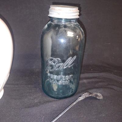 LARGE PITCHER, GREEN BALL CANNING JAR AND A SILVER PLATED LADLE
