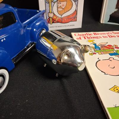 CERAMIC TRUCK, PIGGY BANK, BOOKS AND A GAME