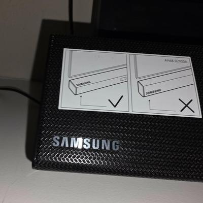 Samsung Sound Bar with subwoofer and headphones