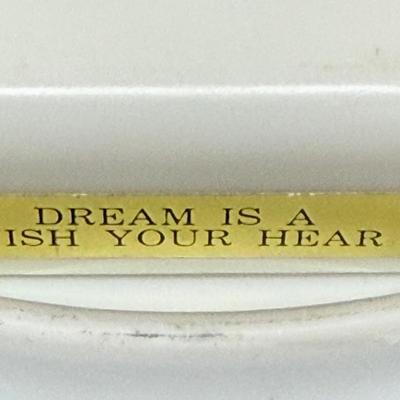 Sale Photo Thumbnail #639: Approx. 7.75” across, small wind-up music box attached plays “ADream is crush Your Heart Makes”.