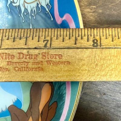 Sale Photo Thumbnail #638: Approx. 7.75” across, small wind-up music box attached plays “ADream is crush Your Heart Makes”.