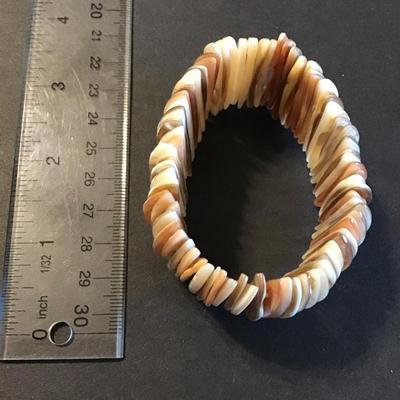 Sale Photo Thumbnail #76: Beautiful natural Shell chip stretch bracelet 
Please see attached photos