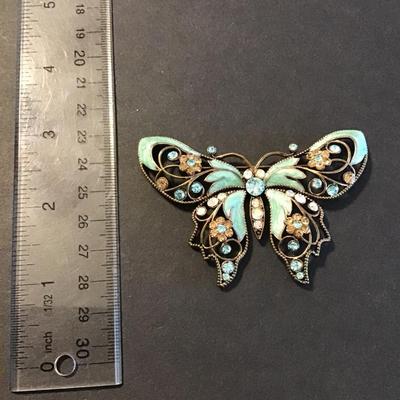 Sale Photo Thumbnail #99: Beautiful Vintage Avon butterfly brooch with turquoise/teal enamel and rhinestones 
Please see attached photos