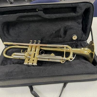 Sale Photo Thumbnail #161: Monoprice Pro-Audio is a general term for professional sound equipment.  
Includes mouthpiece and case.  
Note the multi color metals
Probably a Conn 22B Victor model, the keys have inset Mother of Pearl

Good condition, note the small dent   It is missin