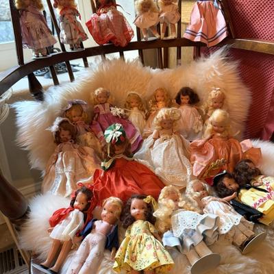 Sale Photo Thumbnail #189: 1930s to 1950s    San Francisco based company
Painted faces, mohair wigs, in original clothing
23 dolls are intact.  1 doll has loose arms.  1 doll needs to have her head reconnected.