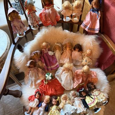 Sale Photo Thumbnail #191: 1930s to 1950s    San Francisco based company
Painted faces, mohair wigs, in original clothing
23 dolls are intact.  1 doll has loose arms.  1 doll needs to have her head reconnected.