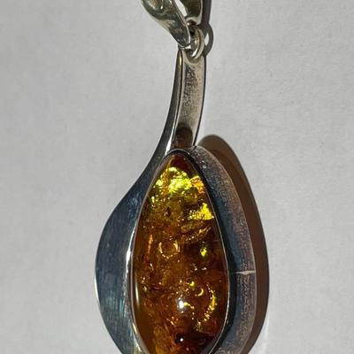 Vintage Poland Baltic Amber Sterling Silver Pendant in VG Preowned Condition as Pictured.