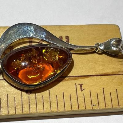 Vintage Poland Baltic Amber Sterling Silver Pendant in VG Preowned Condition as Pictured.