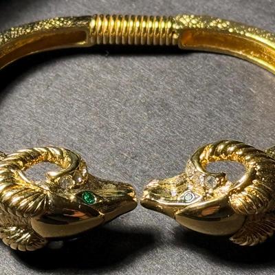 Vintage KJL-Kenneth Jay Lane for Avon Signed Vintage Gold Tone Ram's Head Bracelet Spring Loaded in VG Preowned Condition.