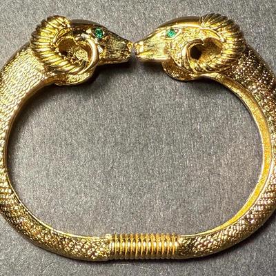 Vintage KJL-Kenneth Jay Lane for Avon Signed Vintage Gold Tone Ram's Head Bracelet Spring Loaded in VG Preowned Condition.
