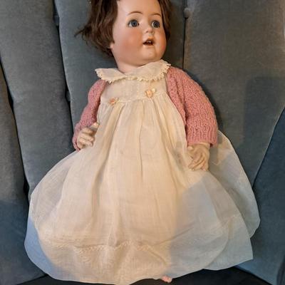 Sale Photo Thumbnail #198: Bisque/porcelain doll made in the Thuringa region of Germany.
Features open and close eyes, composition body, bisque limbs
B 5  - 4 3/4 
good condition