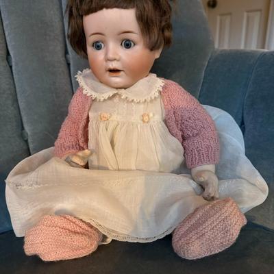 Sale Photo Thumbnail #194: Bisque/porcelain doll made in the Thuringa region of Germany.
Features open and close eyes, composition body, bisque limbs
B 5  - 4 3/4 
good condition