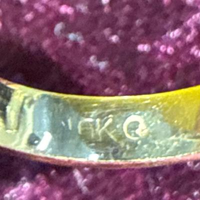 11-10k stamped ring/size 4/4.35 g
