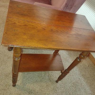 ANTIQUE END TABLE AND A WINGBACK CHAIR