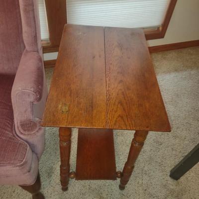 ANTIQUE END TABLE AND A WINGBACK CHAIR