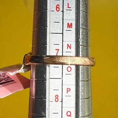 Sale Photo Thumbnail #126: 20-14K Stamped Ring/size 7

4.76 g