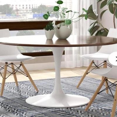 Sale Photo Thumbnail #47:  – Tulip table 38”  wood or white top
- White resin chairs