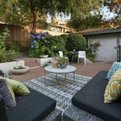 Sale Photo Thumbnail #180:  Outdoor modern gray sofas with cushions/ white coffee table/rug 