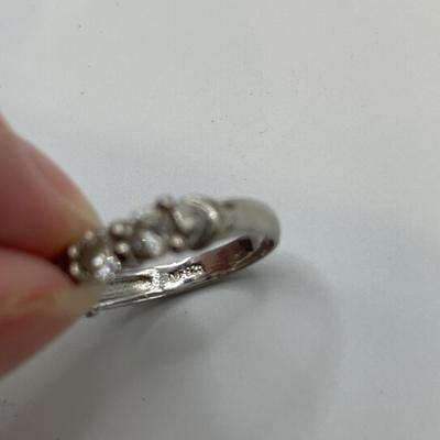 Clear lucite box with sterling CZ ring