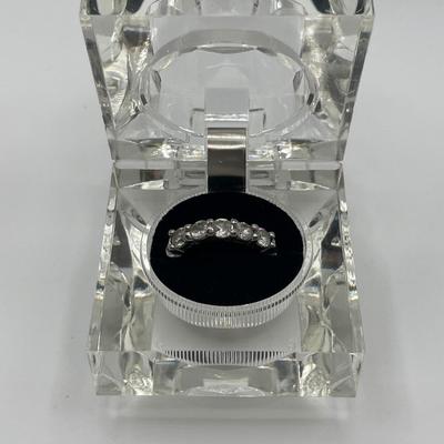 Clear lucite box with sterling CZ ring