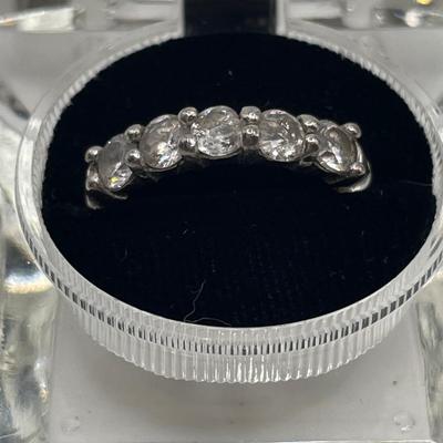 Clear lucite box with sterling CZ ring
