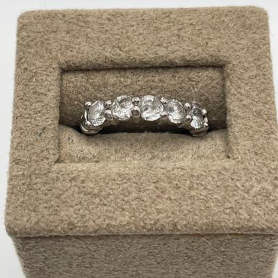 Clear lucite box with sterling CZ ring
