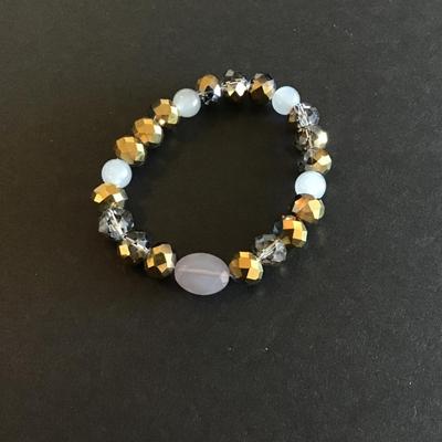 Sale Photo Thumbnail #166: Gold tone faceted beads with opaque beads stretch bracelet Please see attached photos