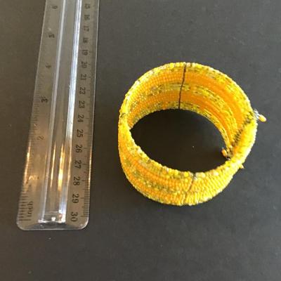 Sale Photo Thumbnail #178: Wide yellow glass beaded bracelet Please see attached photos