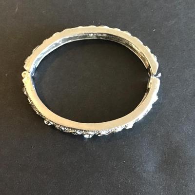 Sale Photo Thumbnail #210: Silver tone hinged bangle bracelet with clear rhinestones Please see attached photos