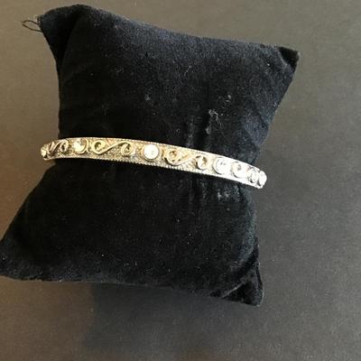Sale Photo Thumbnail #209: Silver tone hinged bangle bracelet with clear rhinestones Please see attached photos