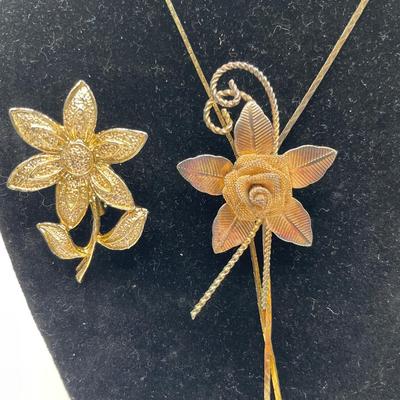 Gerry’s flower pin and slide rose lariat necklace