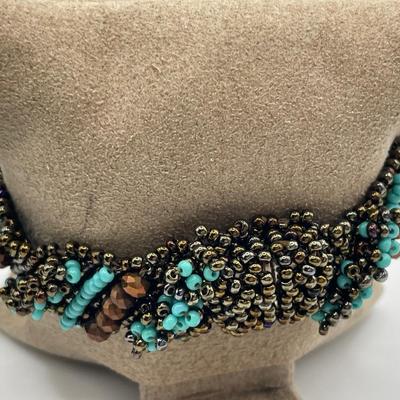 Buffalo horn cuff bracelet with turquoise colored bead bracelet