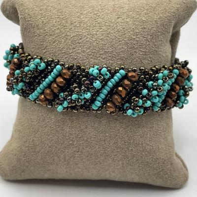 Buffalo horn cuff bracelet with turquoise colored bead bracelet