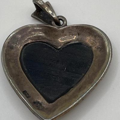 Sterling & marcasite pendant w/ a black onyx heart in center