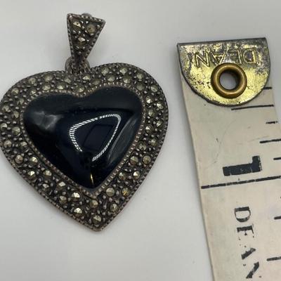 Sterling & marcasite pendant w/ a black onyx heart in center